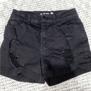 black ripped jean shorts